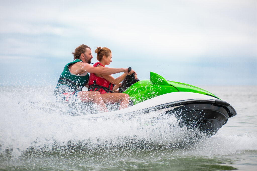 Jet skiing in Cabarete Bay" and "Wakeboarding at Kite Beach in Cabarete.
